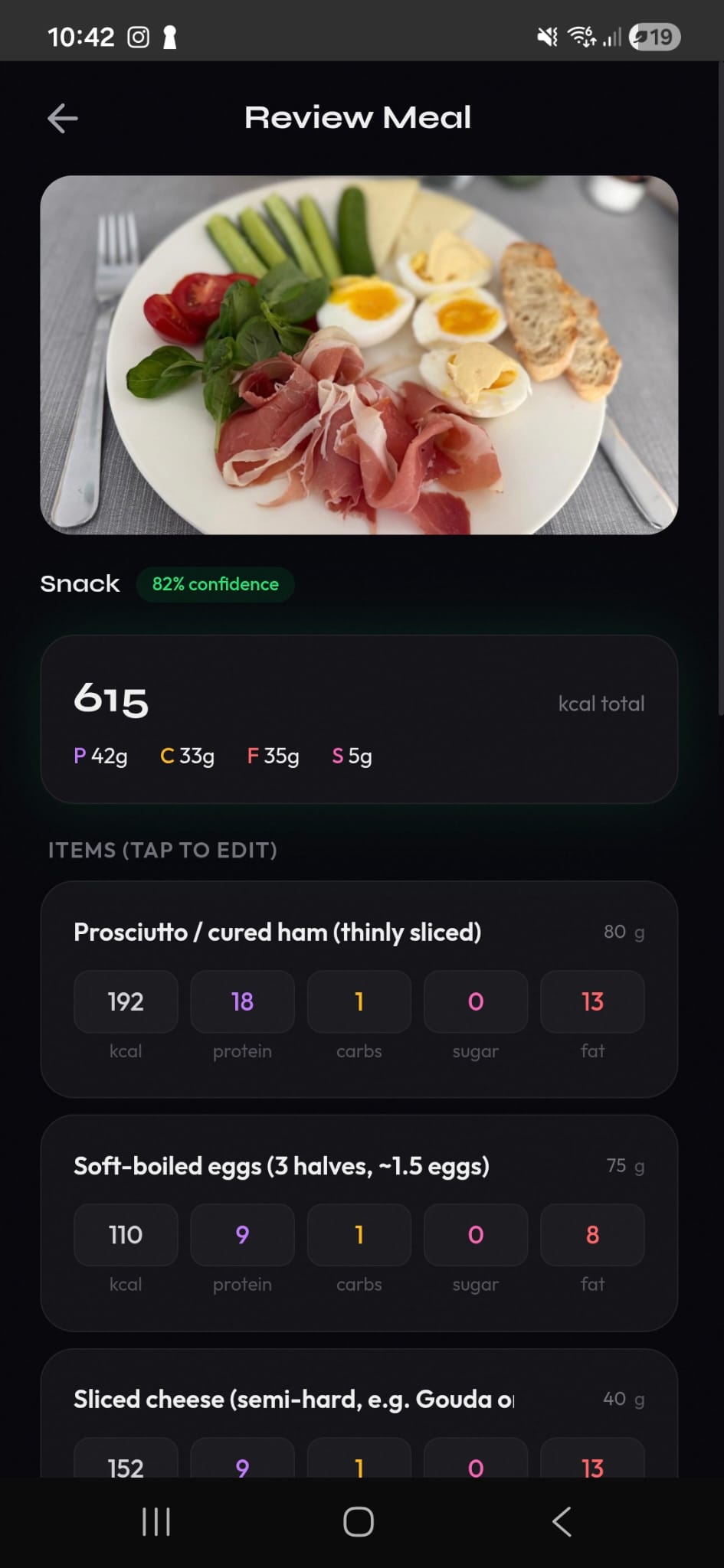 Meal review screen showing detected items with editable calories and macros